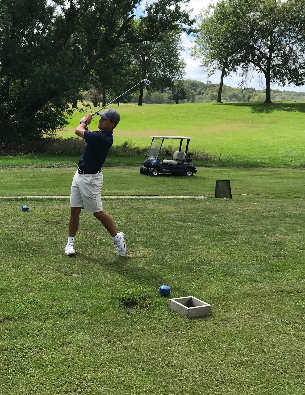 Sophomore, Reinhardt Saunderson, tees off on the par-3 third hole at Lamoni Golf Course in the Graceland Fall Invitational.