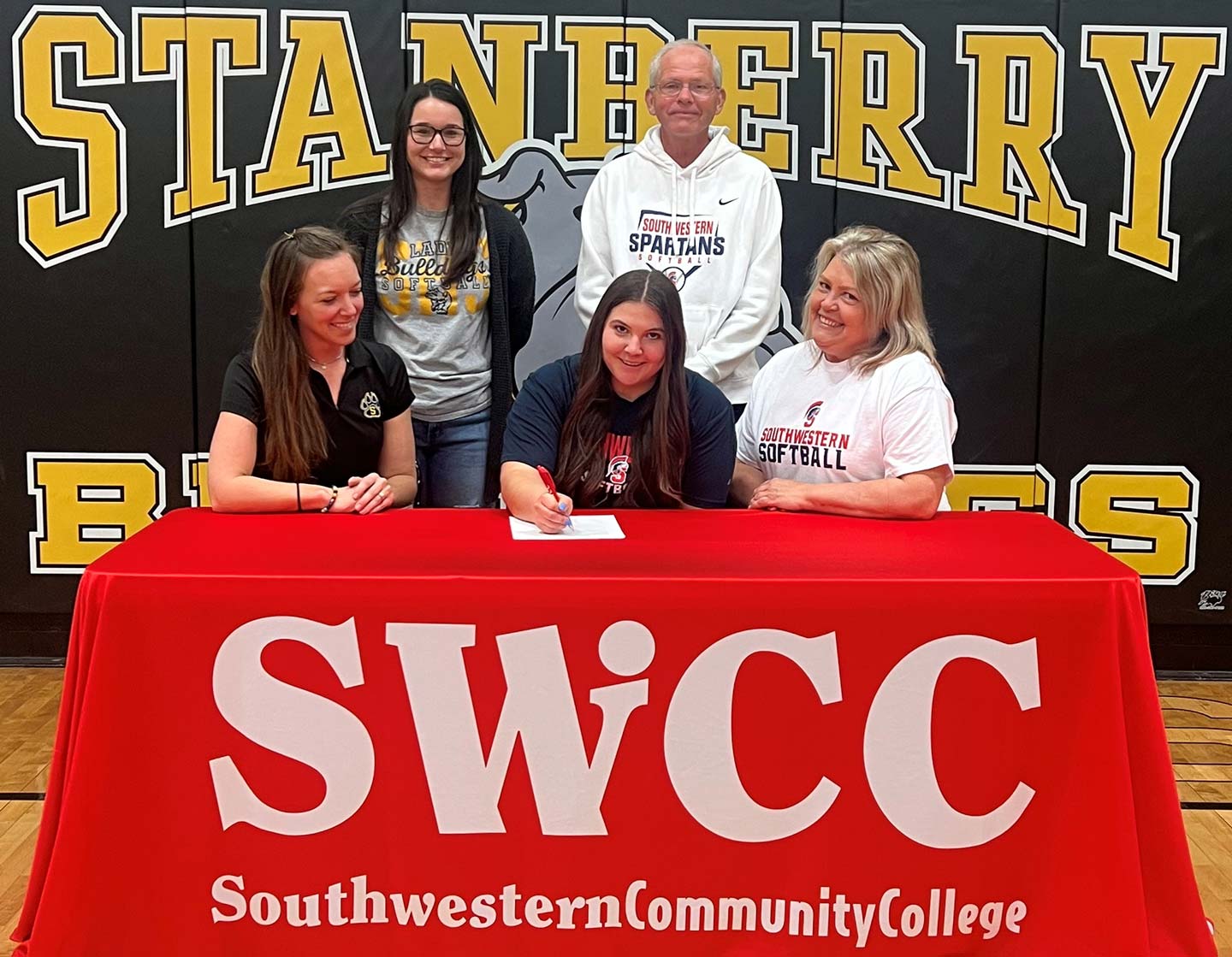 Front row – Brittney McClurg, Stanberry R-11 softball coach; Brea Jenson; Michelle Minton, Brea’s mother; and Riley Gabbert, Stanberry R-11 assistant softball coach.
Back row – Danny Jensen, Southwestern head softball coach.
