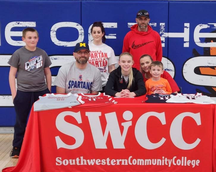 Sitting (L to R): Matt Wiechman, McKenna’s father; McKenna Wiechman; Missy Jacobson, McKenna’s mother; and Kingston, McKenna’s brother. Standing: Teegan, McKenna’s brother; Tiffany Wiechman, McKenna’s stepmother; and Kevin Farr, McKenna’s stepfather.