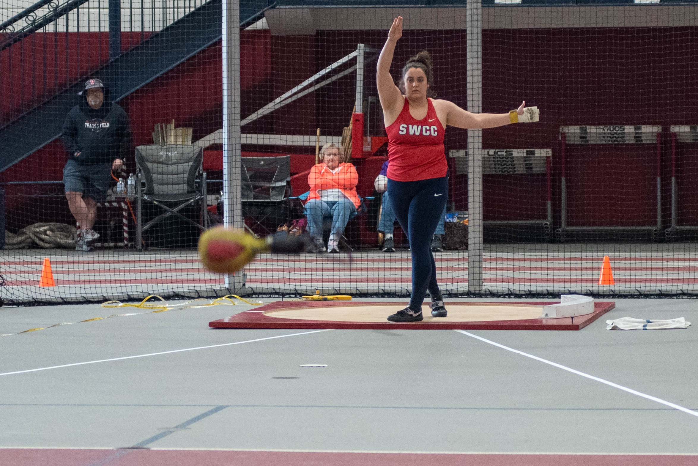 Molly Venteicher throws the weight throw